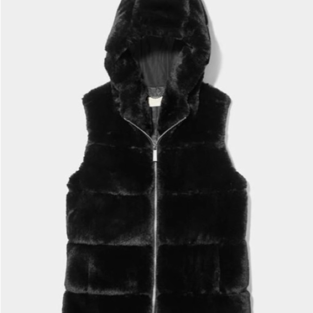Beautiful NEW black faux fur Michael Kors Vest.  Sized XXS, fits like a small.